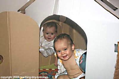 Make your own playhouse with a cardboard box.