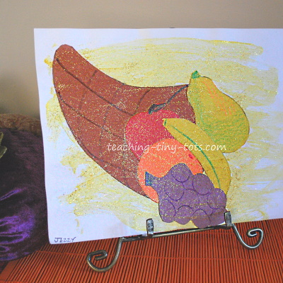 Cornucopia picture for young kids using construction paper and paint.