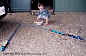 Make duck tape highways for kids to play their cars on and reinforce following directions.