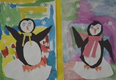 Mixed media penguin picture using paint and construction paper to make the penguin.