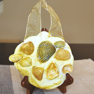 Cute seashell wall hanging made by toddlers.