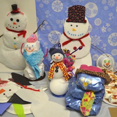 Create a snowman with materials of your choice for a classroom of snowmen.