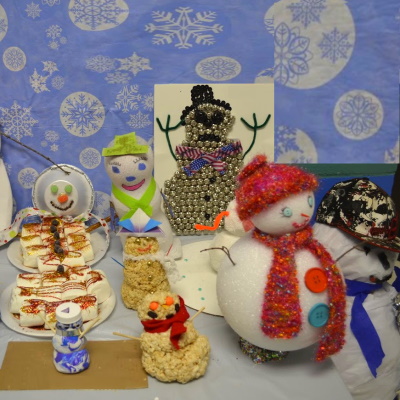 Create a snowman with materials of your choice for a classroom of snowmen.
