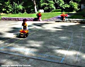 Ride on the chalk highway and reinforce following directions, building coordination and learning colors.