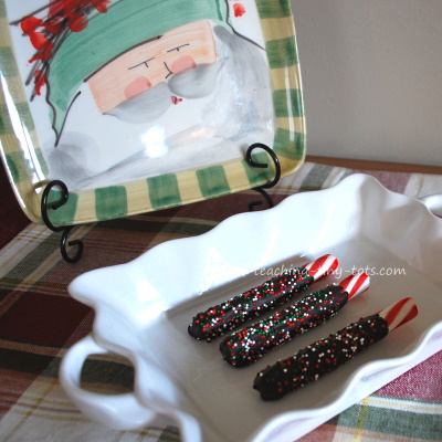 Chocolate dipped peppermint candies with sprinkles.