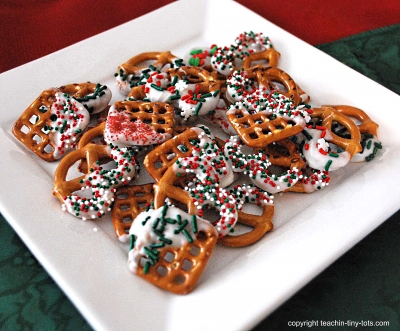 Christmas Pretzels dipped in Chocolate with Sprinkles.