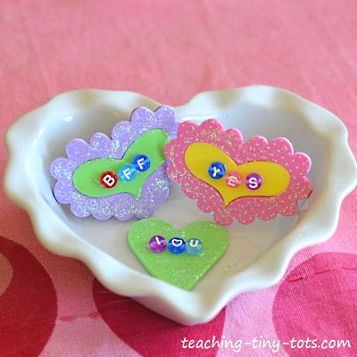 Make these cute conversation heart pin.