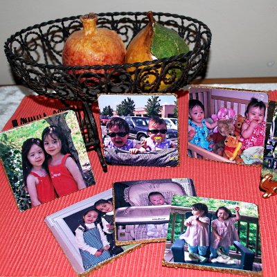 Make these decoupage coasters with favorite pictures.
