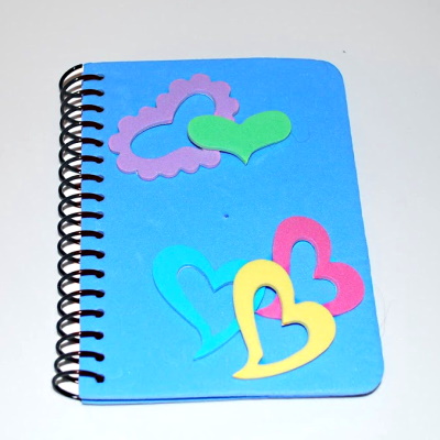 Decorating notebooks with foam stickers