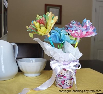 Make these pretty tissue flowers.