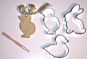 Use a pick to make decorations on the edges of your salt dough ornaments.