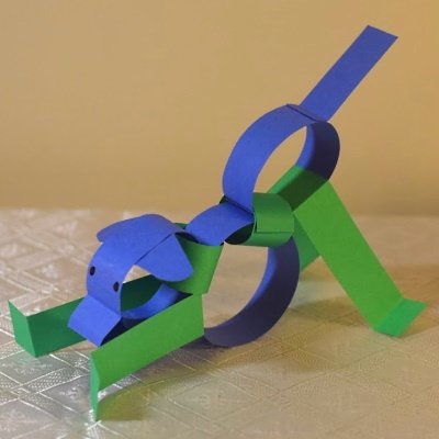 Chinese zodiac dog made of colored construction paper strips.
