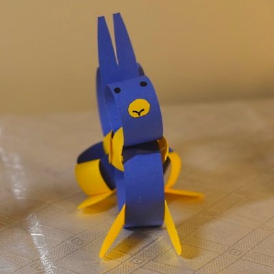 Chinese zodiac rabbit made of colored construction paper strips.